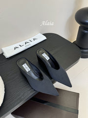 ALAIA HIGH MULES 25S IN BLACK SATIN