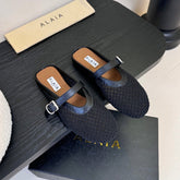 ALAIA FLAT MULES 25S IN BLACK WOVEN MESH