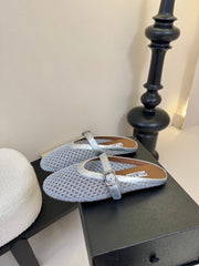 ALAIA FLAT MULES 25S IN GREY MIX SILVER WOVEN MESH