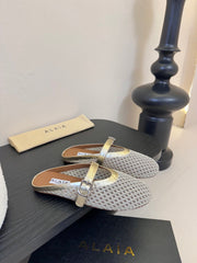 ALAIA FLAT MULES 25S IN GREY MIX GOLD WOVEN MESH