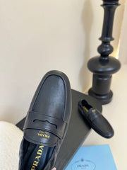 PRADA 25S SHUFFLE LOAFERS IN BLACK CALFSKIN