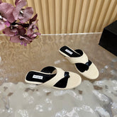 ALAIA PLATFORM THONG SANDALS 25S IN LIGHT BEIGE RAFFIA AND CALFSKIN