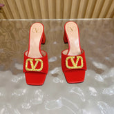 VALENTINO 25S HIGH-HEEL MULES 60 MM IN RED VELVET AND CALFSKIN WITH GOLD HARDWARE