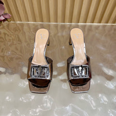 VALENTINO 25S HIGH-HEEL MULES 60 MM IN METALLIC SILVER PATENT CALFSKIN WITH CRYSTAL-EMBELLISHED STRAP