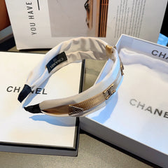 WHITE SILK HAIRBAND WITH GOLD LOGO 412440
