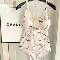 CC BIKINI SWIMSUIT SET IN CREAMY WHITE MIXED WITH CURVED BLACK DETAIL 608919