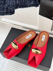 ALAIA FLAT MULE IN CRIMSON RED LAMBSKIN WITH GOLD HARDWARE