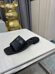 GG CASUAL SLIPPERS IN BLACK CALFSKIN LOGO EMBOSSING