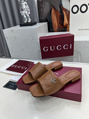 GG CASUAL SLIPPERS IN BROWN CALFSKIN LOGO EMBOSSING