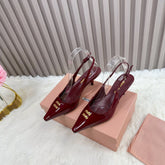 POINTED-TOE SLINGBACK IN WINE RED GLOSSY CALFSKIN