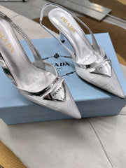 PRADA 25S TRIANGLE LOGO SLINGBACK PUMPS IN SILVER MESH FABRIC