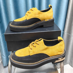 OXFORD SHOES IN GOLD YELLOW SUEDE AND BLACK SHEEPSKIN