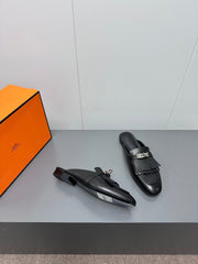 0Z MULE IN BLACK LAMBSKIN WITH FRINGE DETAIL