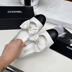 CHANEL 25S MARY JANES IN WHITE MIX BLACK CALFSKIN WITH BOW GOLD HARDWRE