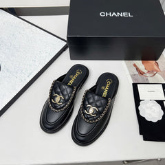 CHANEL 25S MULES WITH CHAIN DETAIL IN BLACK CALFSKIN GOLD HARDWRE