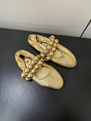 ALAIA SPHERE BALLET FLATS IN GOLDEN LAMBSKIN