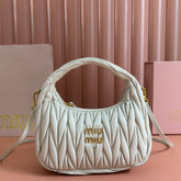 WANDER MATELASSÉ HANDBAG 23 IN WHITE LAMBSKIN