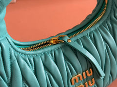 WANDER MATELASSÉ HANDBAG 23 IN LAGOON BLUE LAMBSKIN