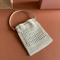 WANDER BUCKET BAG 23 WHITE IN RAFFIA WITH LEATHER TRIM