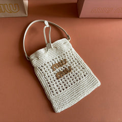 WANDER BUCKET BAG 23 WHITE IN RAFFIA WITH LEATHER TRIM