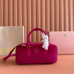 ARCADIE BAG 27 IN FUCHSIA SUEDE GOLD HARDWARE