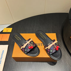 LV SLIDE SANDALS LOGO PRINT 25S IN BLACK CALFSKIN WITH CHERRY BLOSSOM BUCKLE