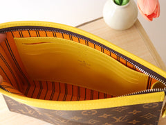 LV 25S POCHETTE VOYAGE 26 IN YELLOW MONOGRAM MACASSAR COATED CANVAS