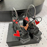 ALAIA BANQUET WEDGE SANDALS IN BLACK LAMBSKIN WITH RED HEART