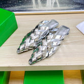 ALFIE LEATHER FLAT MULES IN SILVER PATENT CALFSKIN WITH WOVEN DESIGN