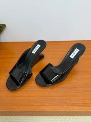 ALAIA WEDGE SANDALS 25S IN BLACK LAMBSKIN