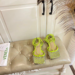 LACE-UP FLAT SANDAL IN NEON YELLOW METALLIZED MESH AND LEATHER WITH RHINSTONES