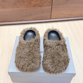 BALENCIAGA 25S MULES IN BROWN FAUX FUR