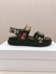 DIOR BACK-STRAP SANDALS 25S IN MOSS GREEN AND BLACK CALFSKIN EMBROIDERED WITH PETITES FLEURS