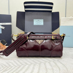 PRADA 25S BONNIE SMALL SHOULDER BAG 26 IN BURGUNDY GLOSSY CALFSKIN GOLD HARDWARE