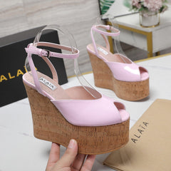 ALAIA WEDGE SANDAL IN ROSE PINK GLOSSY CALFSKIN AND BEIGE RUBBER