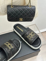 DIAMOND QUILTED CHAIN LAZY SLIPPERS IN BLACK LAMBSKIN