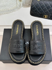 THICK SOLE WEDGE SLIPPERS IN BLACK CALFSKIN
