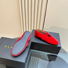 ALAIA BALLET FLATS IN CHERRY RED VELVET