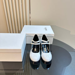 TESS BABIES IN WHITE PATENT CALFSKIN