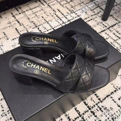 MID HEEL MULES IN BLACK SHEEPSKIN