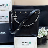 CHANEL 25S LARGE BUCKET BAG 31 IN BLACK SHINY LAMBSKIN SILVER HARDWARE