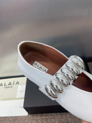 ALAIA MARY JANE FLATS 25S IN WHITE CALFSKIN WITH SILVER HARDWARE