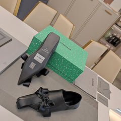 POINTED-TOE FLATS WITH BOW IN BLACK SOFT LAMBSKIN