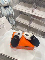 SLIP-ON MULE IN BLACK SUEDE AND SHEARLING LINING