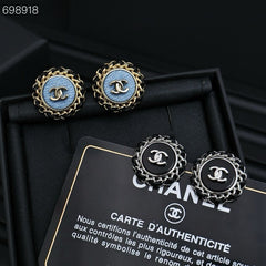CC 25P STUD EARRINGS IN BLUE DENIM BLACK CALFSKIN-THREADED BUTTON