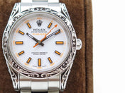 MILGAUSS 40 HAND ENGRAVED CASE WHITE DIAL