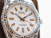 MILGAUSS 40 HAND ENGRAVED CASE WHITE DIAL