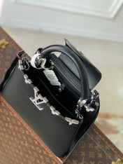 CAPUCINES BB 27 BLACK TAURILLON SILVER HARDWARE