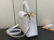 CAPUCINES MM 31 WHITE TAURILLON GOLD HARDWARE