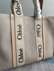 LAGRE WOODY TOTE BAG 45 IN BEIGE LINEN CANVAS BLACK WEBBING LOGO EMBROIDER NUDE CALFSKIN